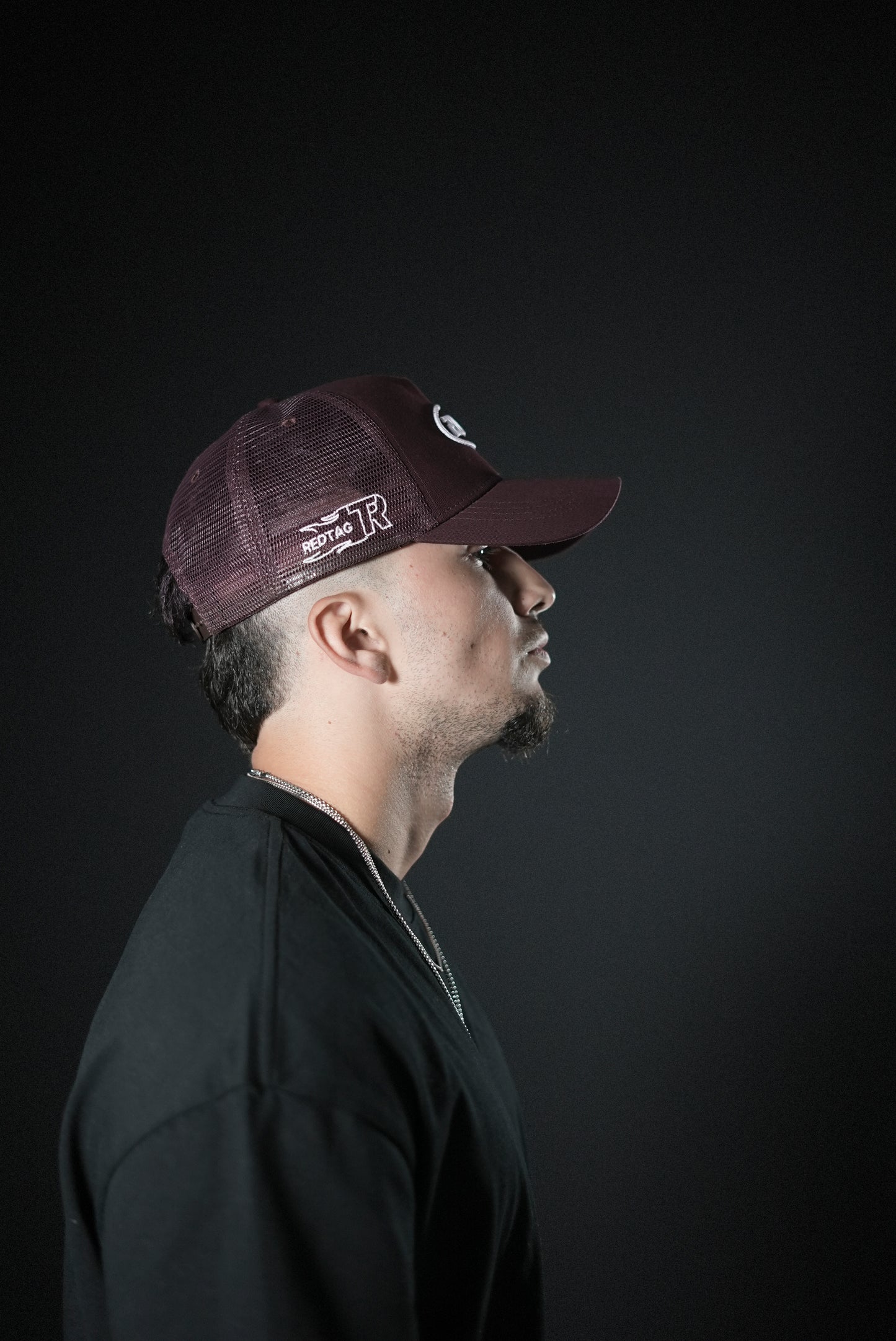 200 MPH Club trucker hat.